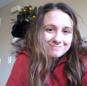 daniWithCatOnHerBack.png