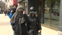 CN (Left) leaving court May 2.png