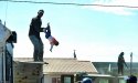 4B1BA05500000578-5611277-Shock_drop_After_dangling_and_swinging_the_baby_over_the_end_of_-a-9_15.jpg