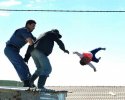 4B1BA07A00000578-5611277-Horror_This_is_the_moment_the_man_throws_his_baby_daughter_over_-a-4_15.jpg