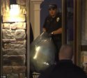 Police_remove_bags.jpg