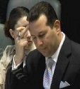 Baez shooting the bird May 10, 2010 Hearing.jpg