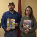 Parents with posters.jpg