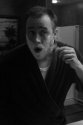 Travis-shaving-shower-door-open-to-right.jpg