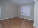 living room area adjacent to entry way.jpg