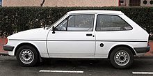220px-Ford_Fiesta_white_side.jpg
