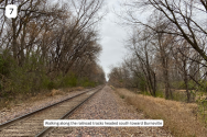 7. Walking along tracks.png