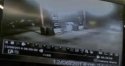 Screen shot of white station wagon parked near store driving in.jpg