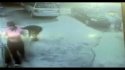Gas jug guy facing pump.jpg
