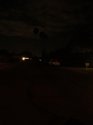 House next door with security lights in front and side.jpg