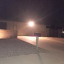 neighbors house with bright security lights in front.jpg