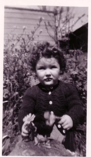 Eliz with flower 2 yrs old.webp
