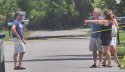 sievers outside people and family pointing to LCSO member closeup.jpg