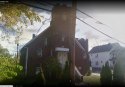 anotther purple and gold windowsed church on Eddy rd.jpg
