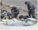 Divers as search continues.png