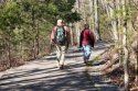 4118748-father-and-son-with-backpacks-and-fishing-rods-going-fishing.jpg