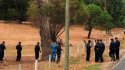 police searching for evidence near CG dump site.jpg