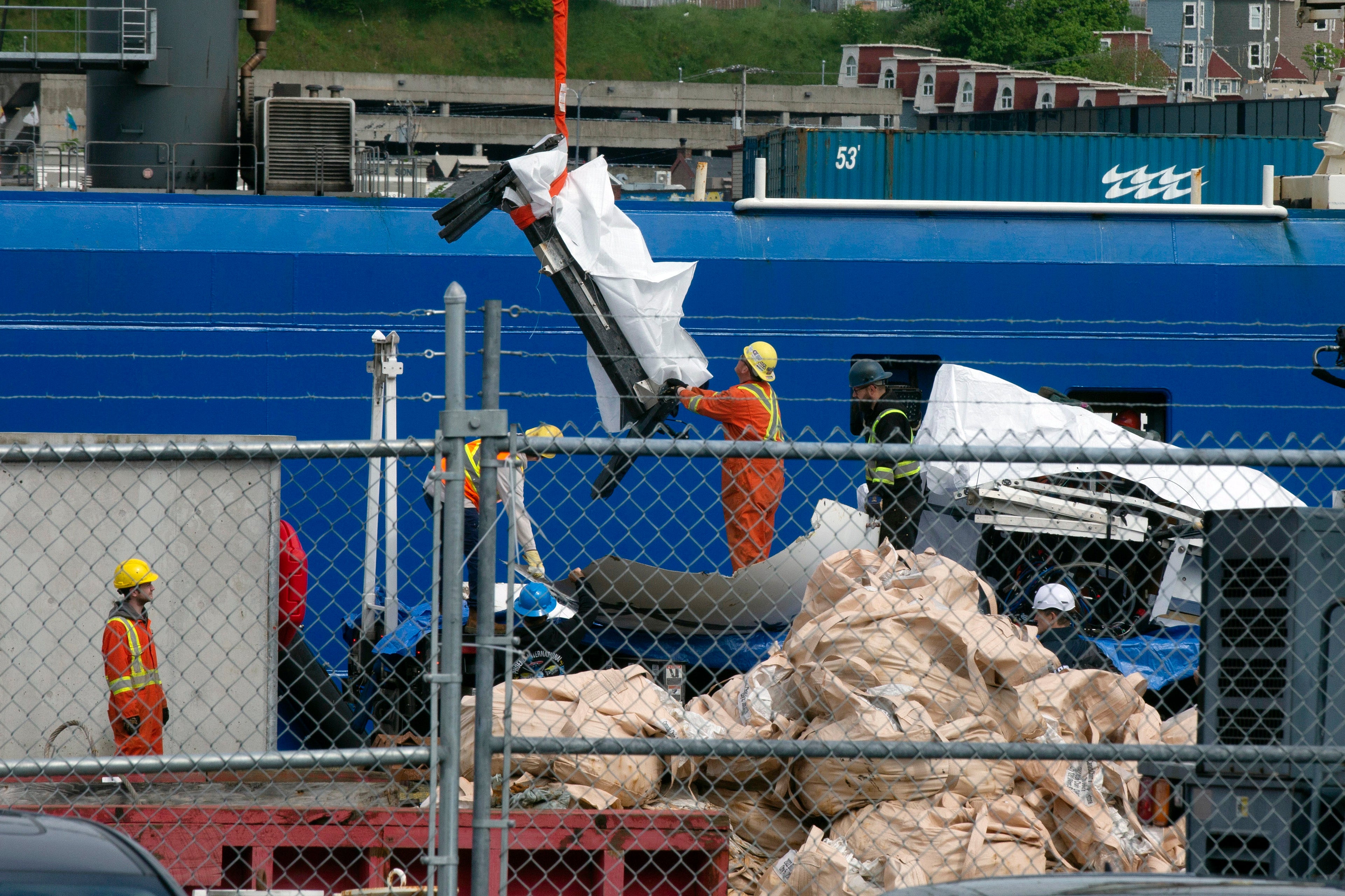 <p>Photos shared by the Associated Press showed what appeared to be several pieces covered with white tarps being unloaded from the American ships Sycamore and Horizon Arctic at a port in St John’s, Newfoundland.</p>