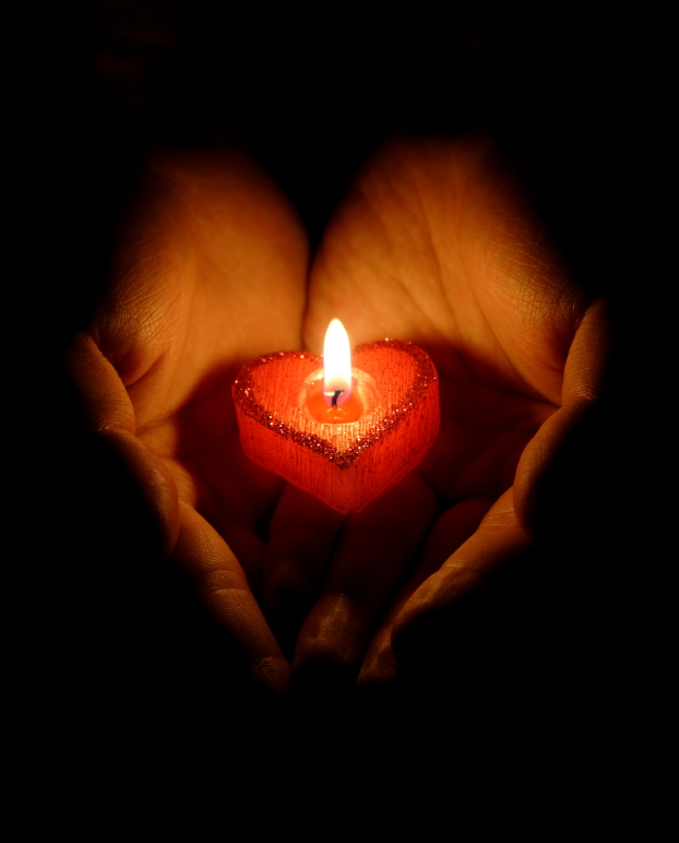 candle-heart-hands.jpeg