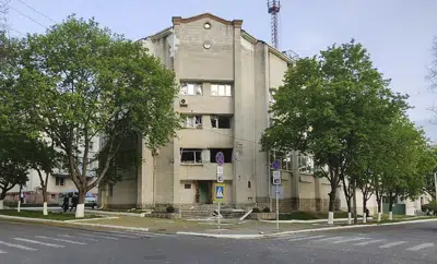 FILE - A view of the damaged building of the Ministry of State Security, in Tiraspol, the capital of the breakaway region of Transnistria, a disputed territory unrecognized by the international community, in Moldova, April 25, 2022. Moldova’s national intelligence agency said on Monday, Dec. 19 that Russia could launch a new offensive next year with an aim to “create a land corridor” to the Moscow-backed breakaway region of Transnistria. (Ministry of Internal Affairs of Transnistria via AP)