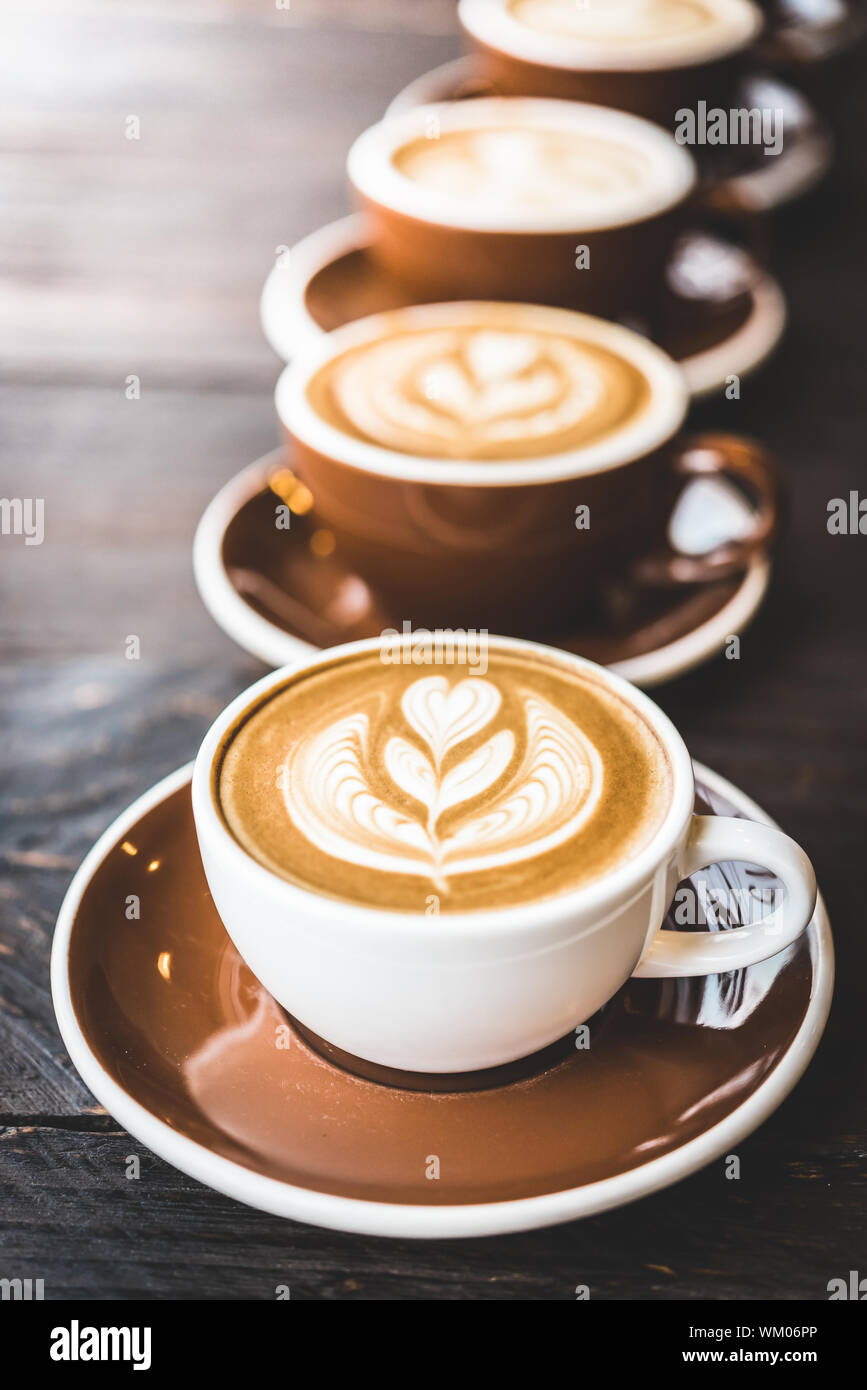 close-up-of-cappuccinos-on-table-WM06PP.jpg