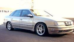 Gold 4-door Ford Taurus