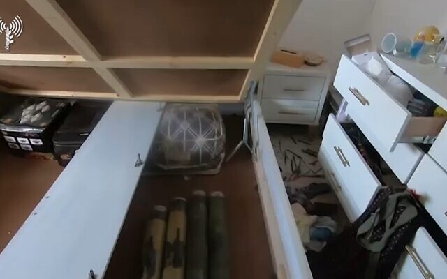 A screenshot from a video provided by the IDF on November 16, 2023, shows rockets stored inside the bed of a young girl in Beit Hanoun, Gaza. (IDF/Screenshot)