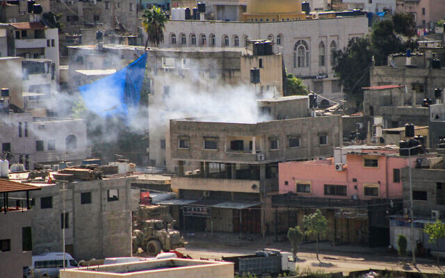Israeli army vehicles seen during a military raid in the West Bank city of Tulkarm on October 19, 2023. (Nasser Ishtayeh/Flash90)