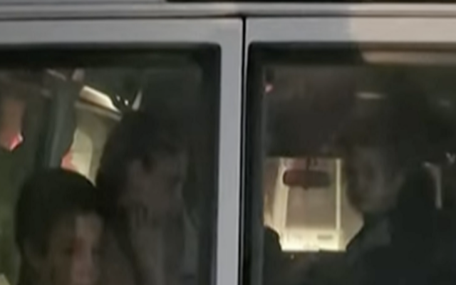 4-year-old Avigail Idan seen in a Red Cross ambulance along with the several other hostages released by Hamas on the third day of the 4-day ceasefire with Israel, November 26, 2023. (Screenshot)