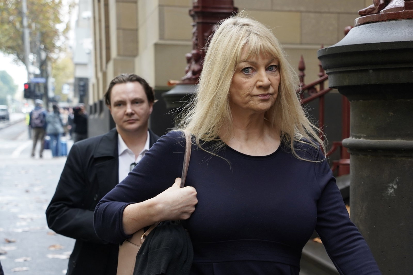 Melanie walking into court