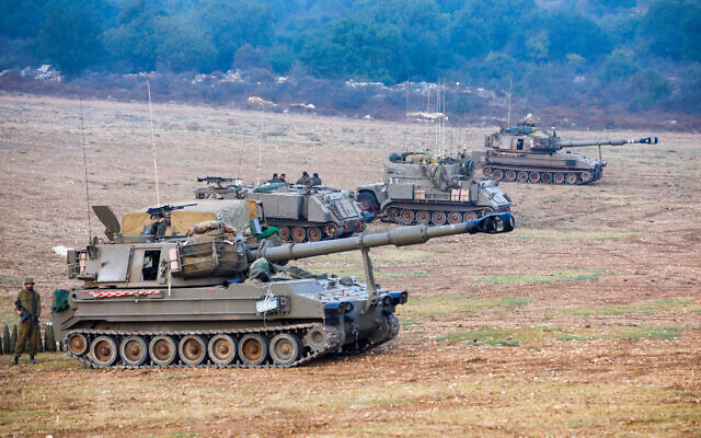 Israeli artillery at an undisclosed location in northern Israel bordering Lebanon on October 8, 2023.  (Photo by JALAA MAREY / AFP)