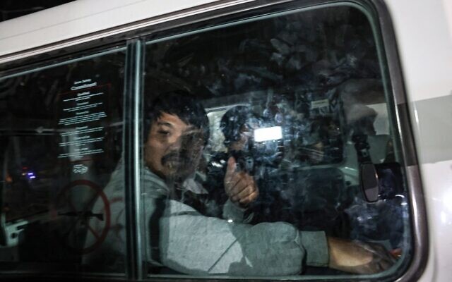 An International Red Cross vehicle carrying hostages released by Hamas drives towards the Rafah border point with Egypt ahead of their transfer to Israel on November 26, 2023. (Mohammed ABED / AFP)