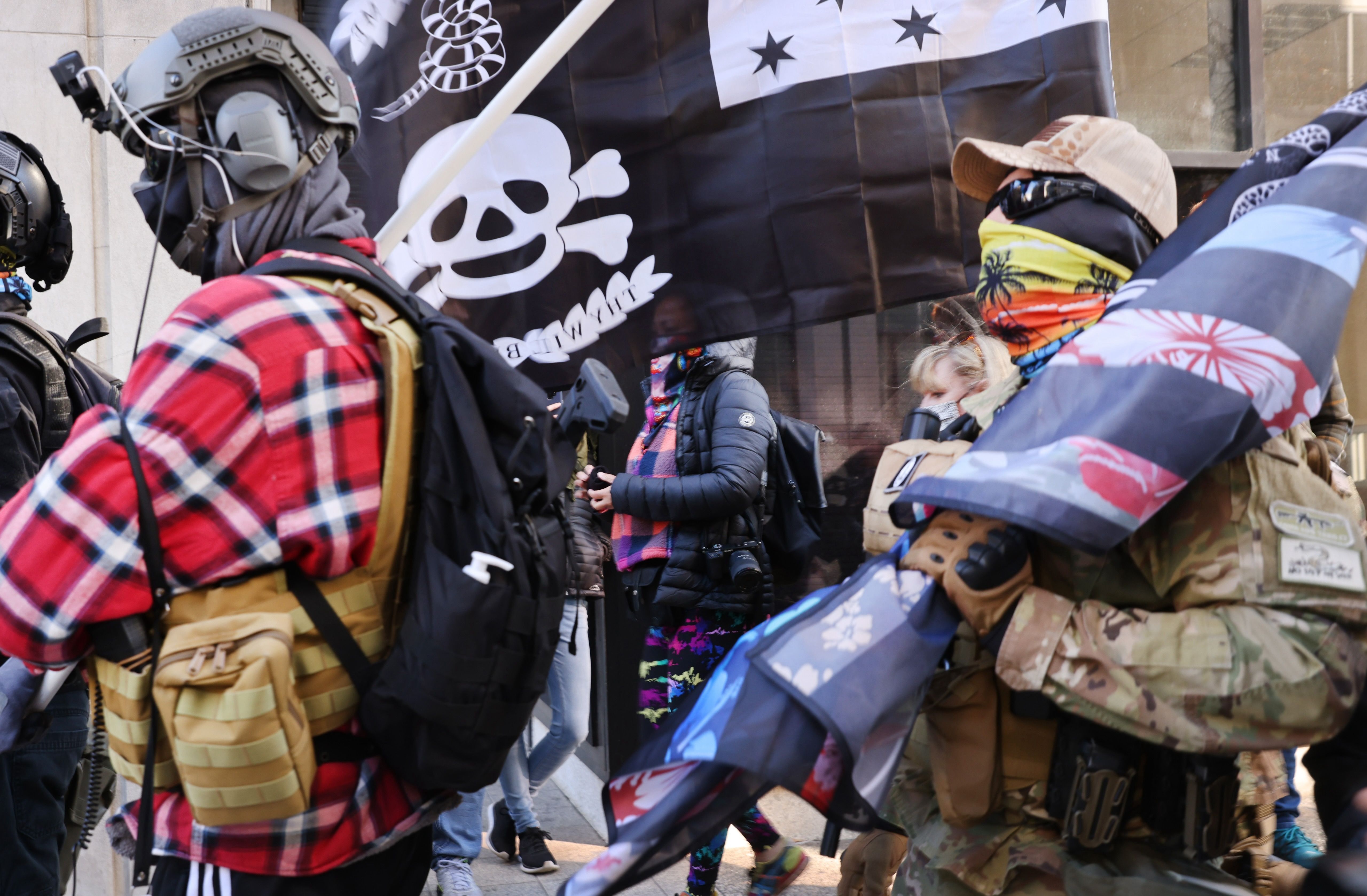 Members of the boogaloo boys join other gun rights advocates in front of the State House as pro-gun supporters gather on January 18, 2021 in Richmond, Virginia. 