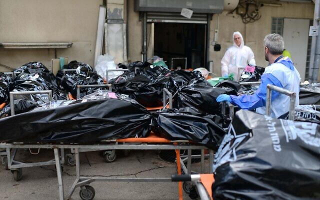 Bodies of the victims of the mass murderous attack by Hamas on southern Israeli communities on October 7, 2023 await advanced examination for identification at the National Center of Forensic Medicine (Abu Kabir) in Jaffa, October 16, 2023. (Tomer Neuberg/Flash90)