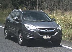 Grey Hyundai ix35 with Queensland registration 414EW3 Grey Hyundai ix35 with Queensland registration 414EW3