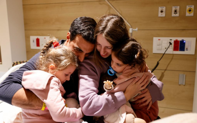 Doron Asher and her two young daughters Raz, 4, and Aviv, 2, are reunited with husband and father Yoni, on November 25, 2023. (Schneider Children's Hospital) Doron Asher and her two young daughters Raz, 4, and Aviv, 2, are reunited with husband and father Yoni, on November 25, 2023. (Schneider Children's Hospital)