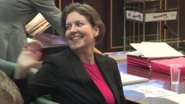 Sarah Boone smiles ahead of opening statements in her murder trial. 