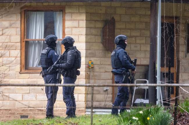 About six members of the Critical Incident Response Team searched the property. Picture: Jason Edwards