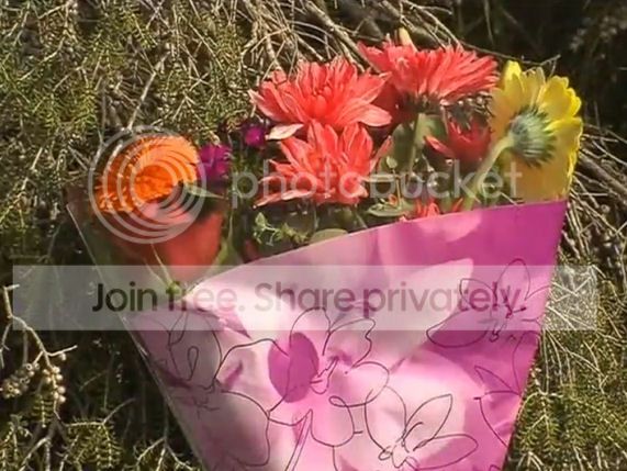 Police%20lay%20flowers2_zpsrdte1qs6.jpg
