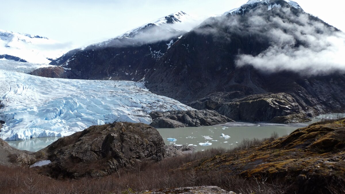 FILE - Chunks of ice float in Mendenhall Lake in front of the Mendenhall Glacier on April 29,... FILE - Chunks of ice float in Mendenhall Lake in front of the Mendenhall Glacier on April 29,...