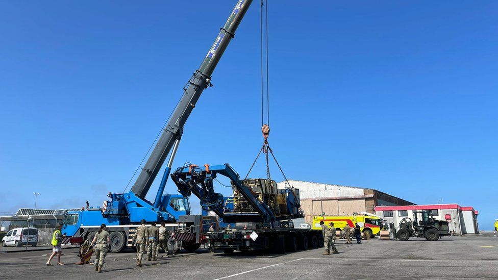 A crane lifting the ROV at Jersey Airport A crane lifting the ROV at Jersey Airport