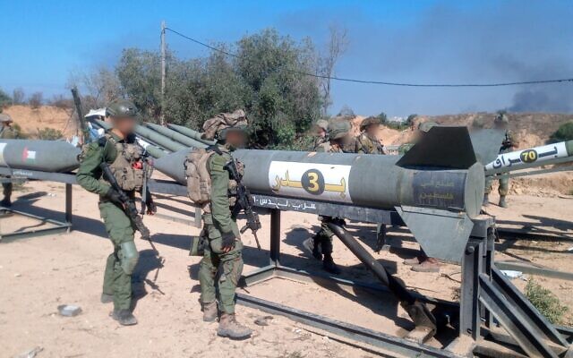 Israeli soldiers inspect Iran-made Badr-3 rockets at an Islamic Jihad outpost in northern Gaza on November 17, 2023 (IDF) Israeli soldiers inspect Iran-made Badr-3 rockets at an Islamic Jihad outpost in northern Gaza on November 17, 2023 (IDF)