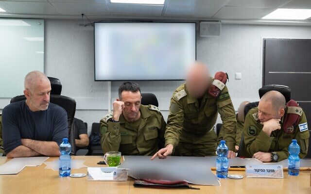 L-R: Shin Bet head Ronen Bar, IDF Chief of Staff Lt. Gen. Herzi Halevi, an unknown officer, and the head of the Southern Command, Maj. Gen. Yaron Finkelman, hold a meeting, December 2, 2023. (Israel Defense Forces) L-R: Shin Bet head Ronen Bar, IDF Chief of Staff Lt. Gen. Herzi Halevi, an unknown officer, and the head of the Southern Command, Maj. Gen. Yaron Finkelman, hold a meeting, December 2, 2023. (Israel Defense Forces)